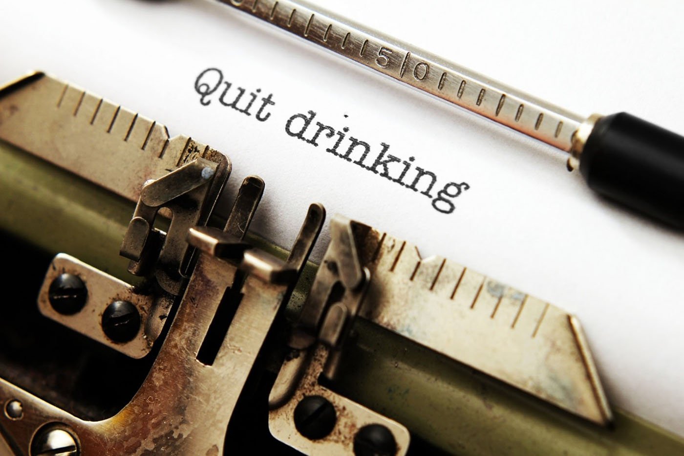 "Quit Drinking" on typewriter