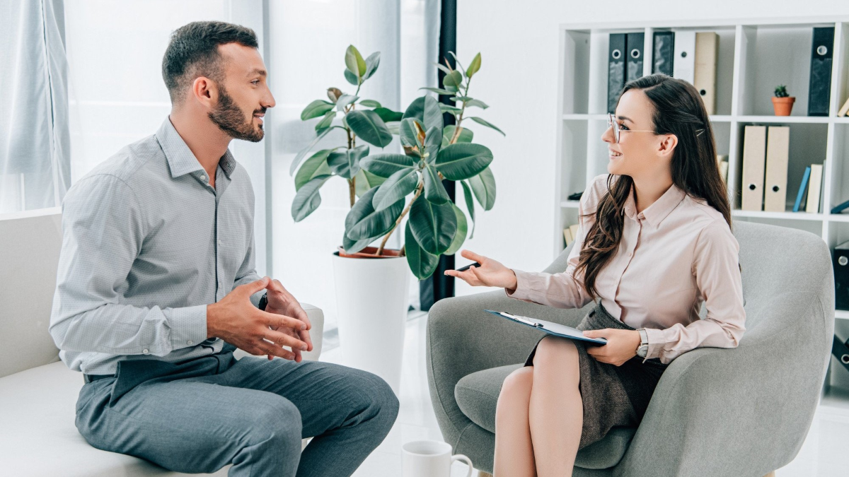 two work professionals talking