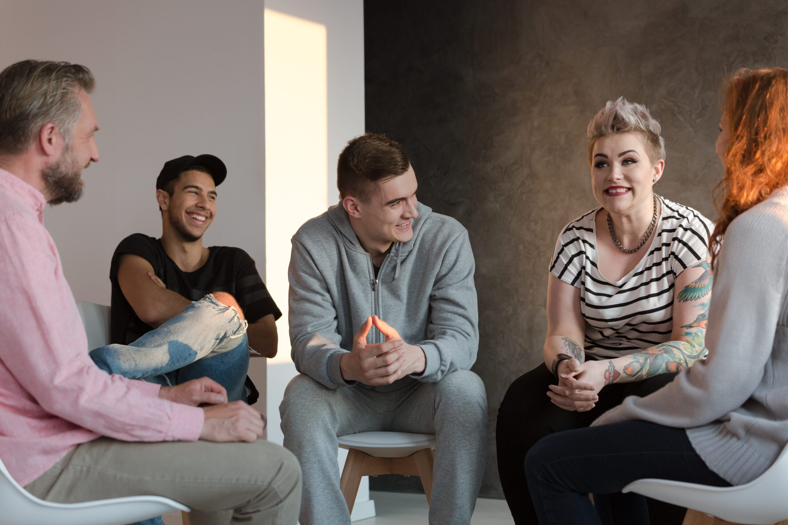 Teenagers in a group counseling session for youth
