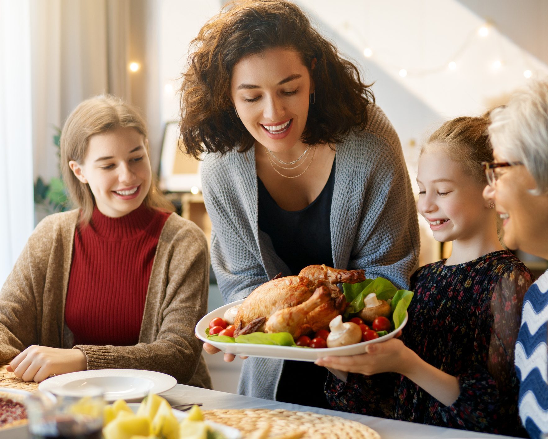 Family enjoying food happily, 