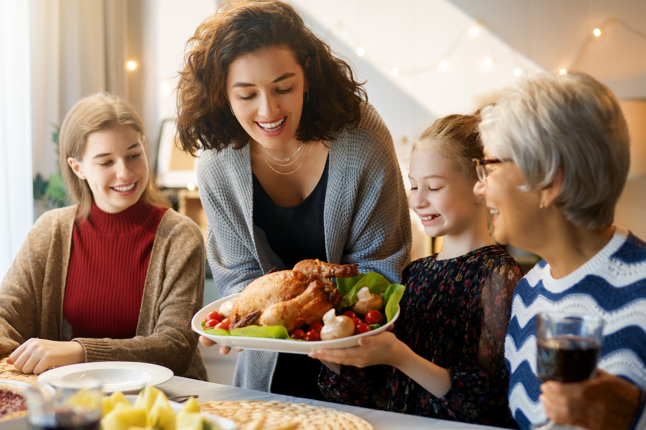 Family enjoying food happily, 